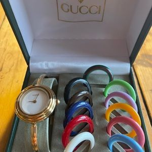 Vintage Gucci watch NOT CURRENTLY WORKING needs repair. Gold and all rings.